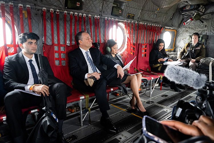 Vice President Kamala Harris and Second Gentleman Doug Emhoff travelling aboard an Army Two helicopter to Alabama. Image taken by Saul Loeb / AFP 